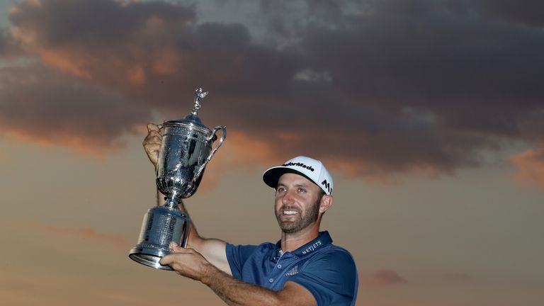 Johnson celebrates his three-shot victory  