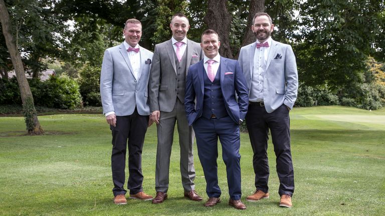 Eamon McConomy (second from left), with husband Steve. 'The wedding photo is of Steve and myself at our wedding, with our best men. Steve's friend Des and my cousin Gareth. From left to right, Gareth, myself, Steve and Des.'