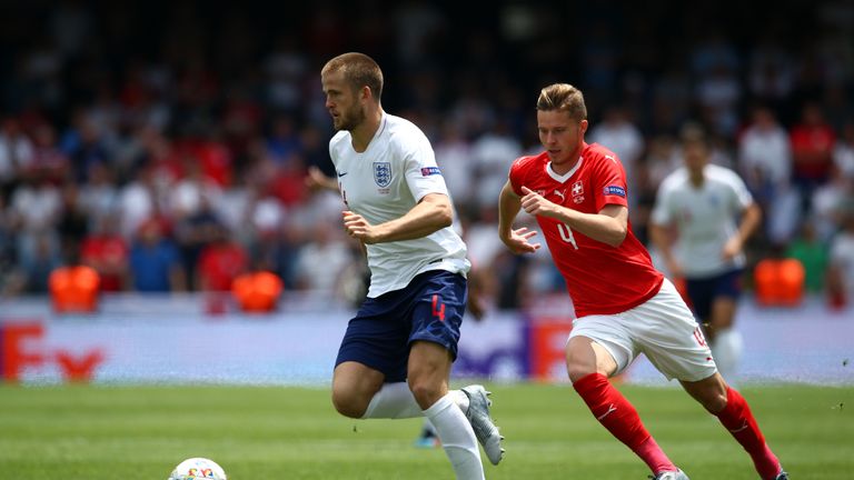 Eric Dier of England battles for possession with Nico Elvedi of Switzerland 