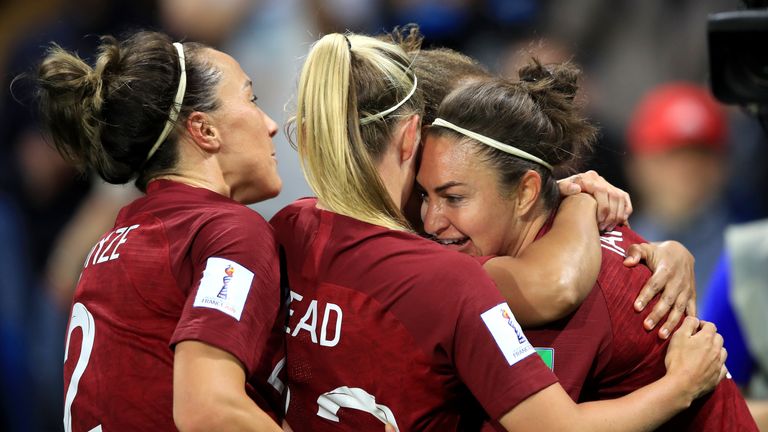 Jodie Taylor celebrates scoring for England Women against Argentina with teammates Beth Mead and Lucy Bronze.