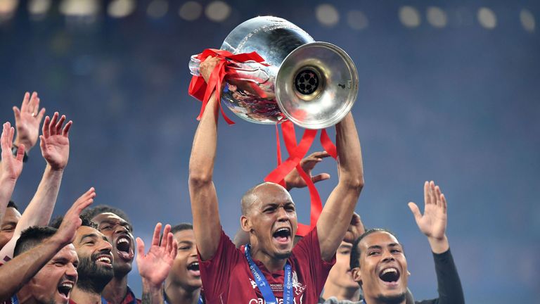 Fabinho holds the Champions League trophy aloft at the Wanda Metripolitano stadium in Madrid on June 1.