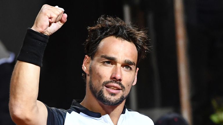 Italy's Fabio Fognini celebrates after winning against France's Jo-Wilfried Tsonga during their ATP Masters tournament tennis match at the Foro Italico in Rome, on May 13, 2019 