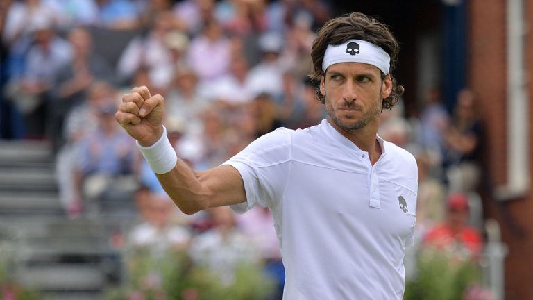 Feliciano Lopez reacts after winning a point against France's Gilles Simon in their men's singles final tennis match at the ATP Fever-Tree Championships tournament at Queen's Club in west London on June 23, 2019.