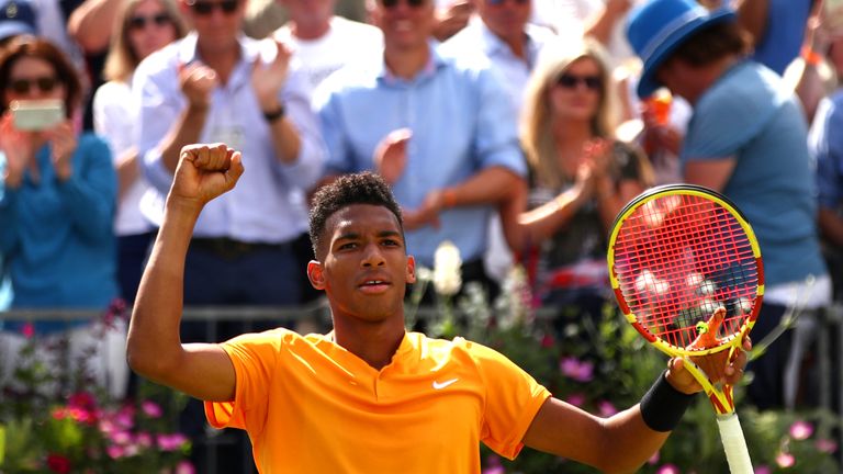 Canada's Felix Auger Aliassime celebrates his win over Greece's Stefanos Tsitsipas in their men's singles quarter final tennis match at the ATP Fever-Tree Championships tournament at Queen's Club in west London on June 21, 2019. 