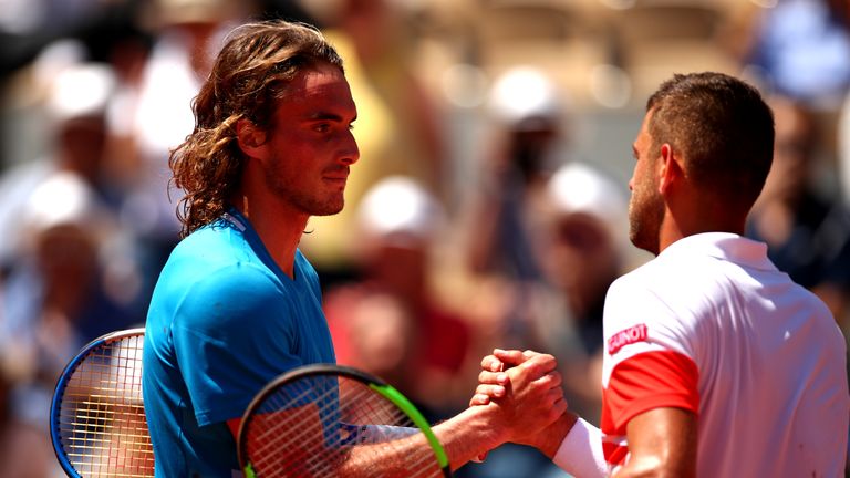 Filip Krajinovic of Serbia shakes hands with victor Stefanos Tsitsipas of Greece following their mens singles third round match during Day seven of the 2019 French Open at Roland Garros on June 01, 2019 in Paris, France.