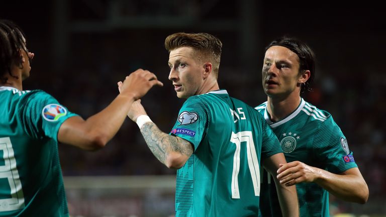 marco reus celebrates after scoring for germany against belarus