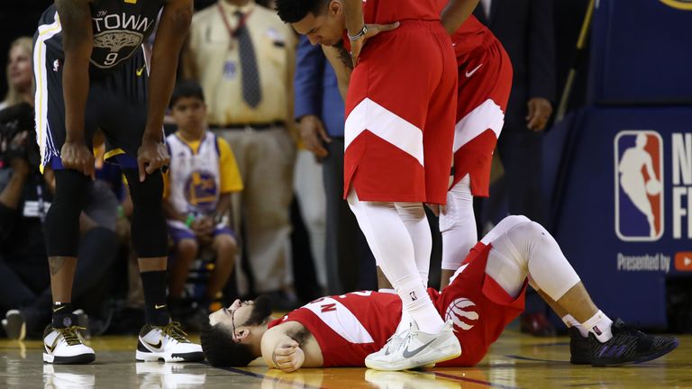 Fred VanVleet lies on the ground after taking an elbow to the forehead in Game 4