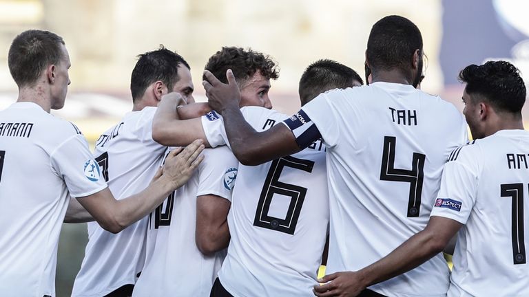 Germany players celebrate during their 4-2 win over Romania in Bologna
