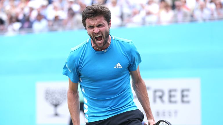 Gilles Simon gestures against Spain's Feliciano Lopez in their men's singles final tennis match at the ATP Fever-Tree Championships tournament at Queen's Club in west London on June 23, 2019. 