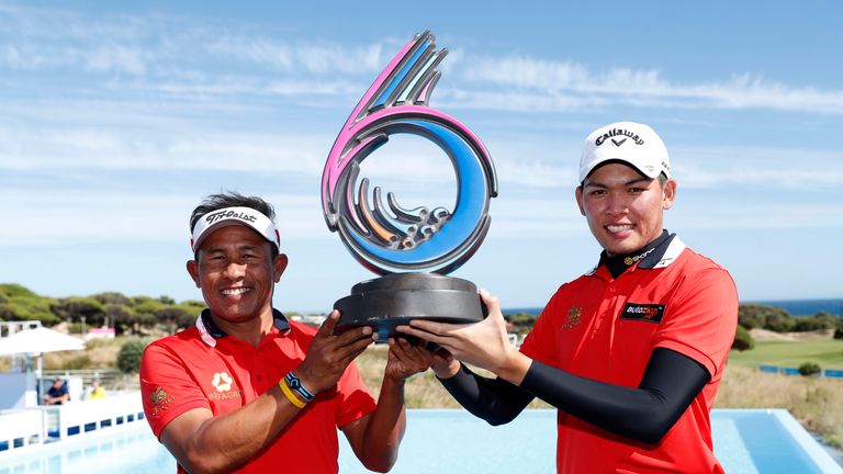  Thongchai Jaidee and Phachara Khongwatmai of Thailand celebrate victory with the trophy during Day Two of the GolfSixes