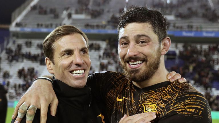 Argentina's Jaguares head coach Gonzalo Quesada (L) and number 8 Javier Ortega Desio celebrate after defeating Australia's Brumbies by 39-7 in a Super Rugby semifinal match against Argentina's Jaguares at Jose Amalfitani stadium in Buenos Aires, on June 28, 2019. (Photo by ALEJANDRO PAGNI / AFP) (Photo credit should read ALEJANDRO PAGNI/AFP/Getty Images)