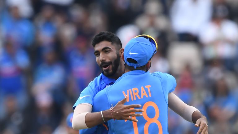 India skipper Virat Kohli hugs Jasprit Bumrah after the seamer dismissed South Africa's Hashim Amla