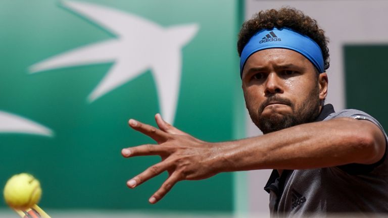 France's Jo-Wilfried Tsonga plays a forehand return to Japan's Kei Nishikori during their men's singles second round match on day four of The Roland Garros 2019 French Open tennis tournament in Paris on May 29, 2019.