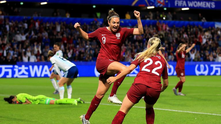 Jodie Taylor celebrates her goal