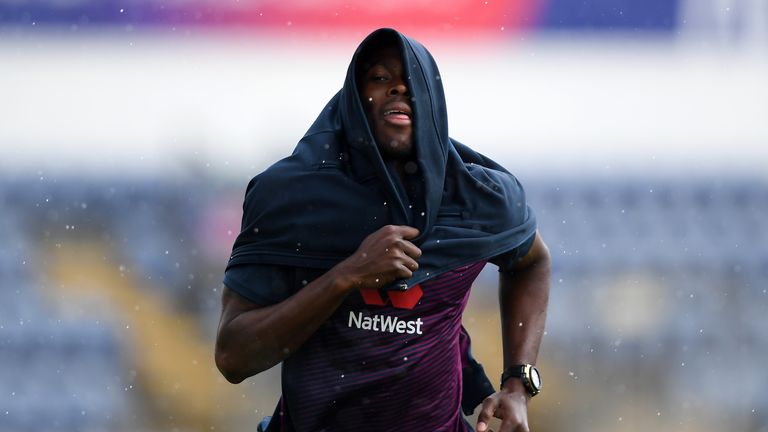 Jofra Archer runs for cover as rain arrives at Cardiff ahead of England's World Cup clash against Bangladesh