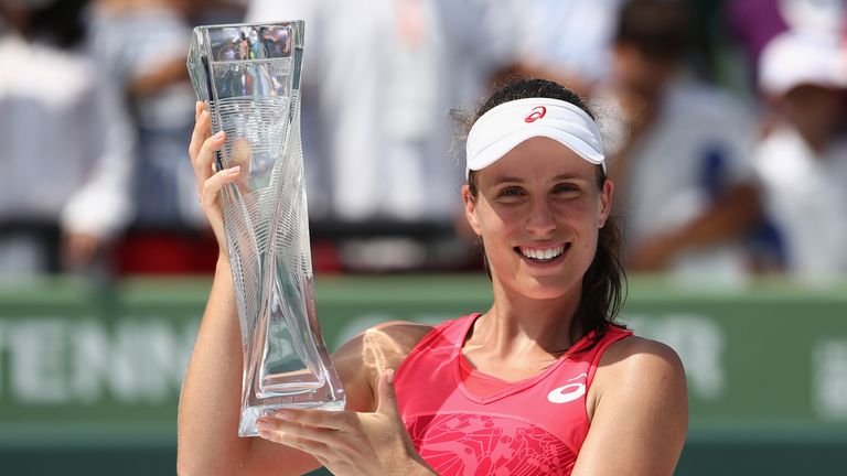 Johanna Konta of Great Britain celebrates with the trophy after defeating Caroline Wozniacki of Denmark in the final at Crandon Park Tennis Center on April 1, 2017 in Key Biscayne, Florida.