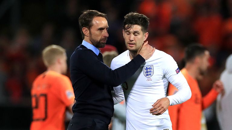 Gareth Southgate consoles John Stones after England's defeat