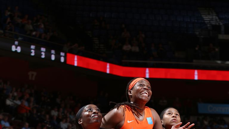Chiney Ogwumike #13 of the Los Angeles Sparks and Jonquel Jones #35 of the Connecticut Sun fight for position during the game on June 6, 2019 at the Mohegan Sun Arena in Uncasville, Connecticut