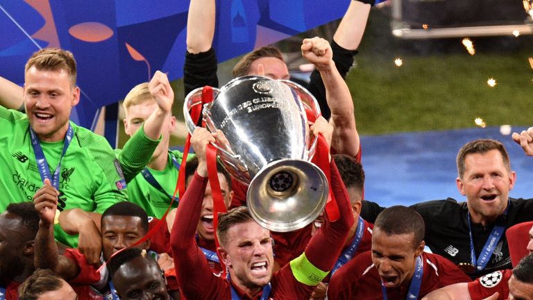 Jordan Henderson lifts Champions League trophy