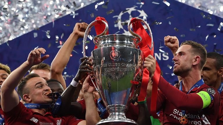 Jordan Henderson lifts the Champions League trophy