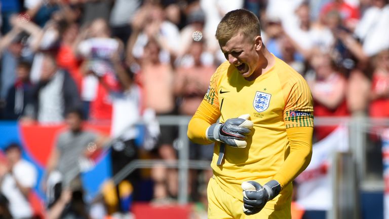 Jordan Pickford celebrates after England's win over Switzerland