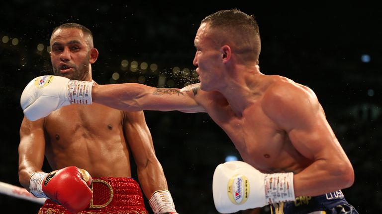 LEEDS, ENGLAND - JUNE 15: Josh Warrington (R) in action with Kid Galahad during the IBF World Featherweight Title fight between Josh Warrington and Kid Galahad at First Direct Arena on June 15, 2019 in Leeds, England. (Photo by Nigel Roddis/Getty Images)