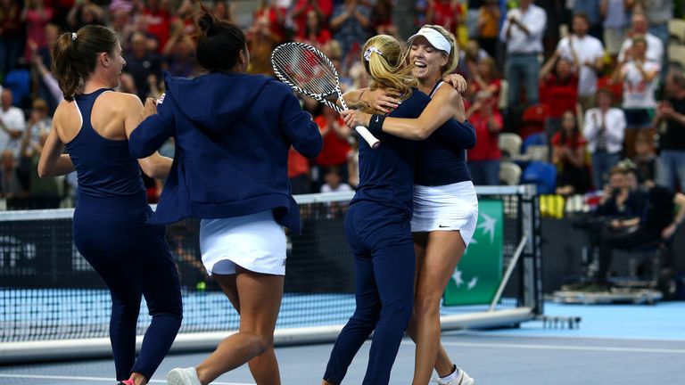 Katie Swan embraces Fed Cup team-mate Katie Boulter as Team GB earn promotion 