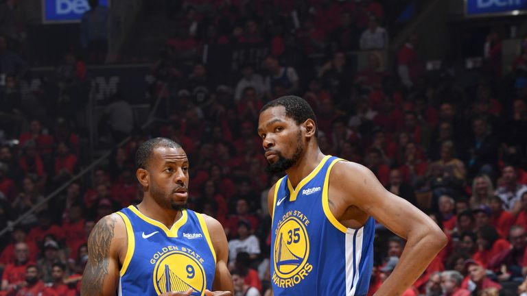 Andre Iguodala #9 and Kevin Durant #35 of the Golden State Warriors talk during Game Five of the NBA Finals against the Toronto Raptors on June 10, 2019 at Scotiabank Arena in Toronto, Ontario, Canada.