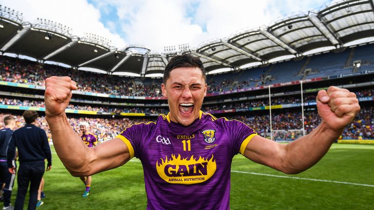 Lee Chin celebrates at full-time