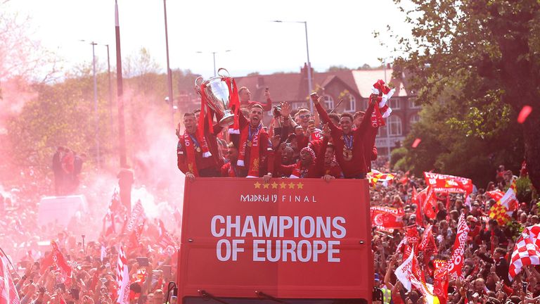 Liverpool's players enjoyed a triumphant return to Merseyside after winning the Champions League.