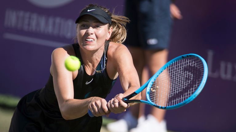 Russia's Maria Sharapova hits a return against Slovakia's Viktoria Kuzmova during their women's singles match of the Mallorca Open tennis tournament in Santa Ponca on June 18, 2019.