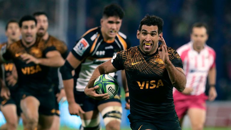 Argentina's Jaguares centre Matias Orlando (R) runs with the ball past Australia's Brumbies half scrum Jahrome Brown during their Super Rugby semifinal match at Jose Amalfitani stadium in Buenos Aires, on June 28, 2019. (Photo by ALEJANDRO PAGNI / AFP) (Photo credit should read ALEJANDRO PAGNI/AFP/Getty Images)