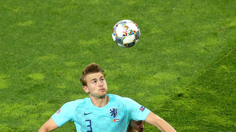 Matthijs de Ligt beats Bernardo Silva to the ball in the Nations League final