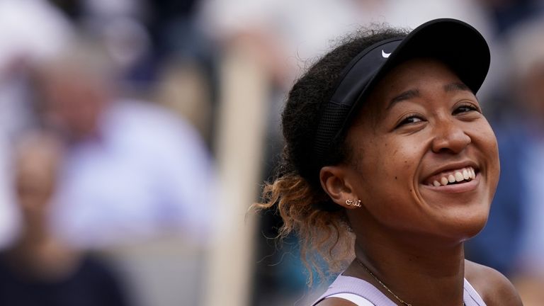 Japan's Naomi Osaka celebrates after winning against Belarus' Victoria Azarenka during their women's singles second round match on day five of The Roland Garros 2019 French Open tennis tournament in Paris on May 30, 2019. 