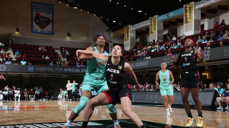 Dearica Hamby #5 of the Las Vegas Aces and Reshanda Gray #12 of the New York Liberty fight for position on June 9, 2019 at the Westchester County Center, in White Plains, New York.