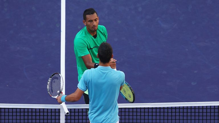 Nick Kyrgios of Australia shakes hands at the net after his straight set victory against Novak Djokovic of Serbia in their fourth round match during day ten of the BNP Paribas Open at Indian Wells Tennis Garden on March 15, 2017 in Indian Wells, California. 