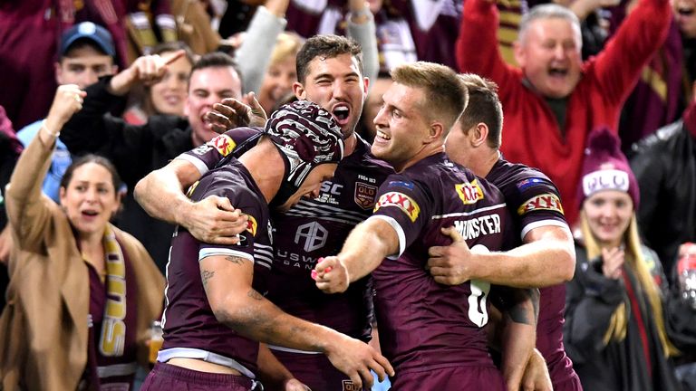 Queensland Maroons celebrate their opening with over New South Wales Blues