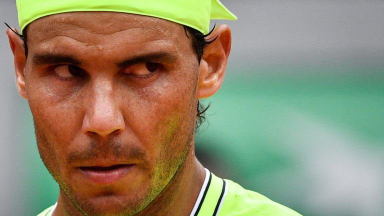 Spain's Rafael Nadal reacts as he plays against Austria's Dominic Thiem during their men's singles final match, on day fifteen of The Roland Garros 2019 French Open tennis tournament in Paris on June 9, 2019.