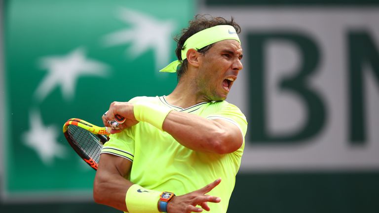 Rafael Nadal of Spain plays a forehand during the mens singles final against Dominic Thiem of Austria during Day fifteen of the 2019 French Open at Roland Garros on June 09, 2019 in Paris, France