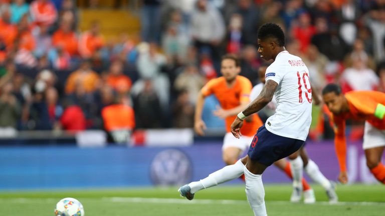 Marcus Rashford slots home his penalty against the Netherlands