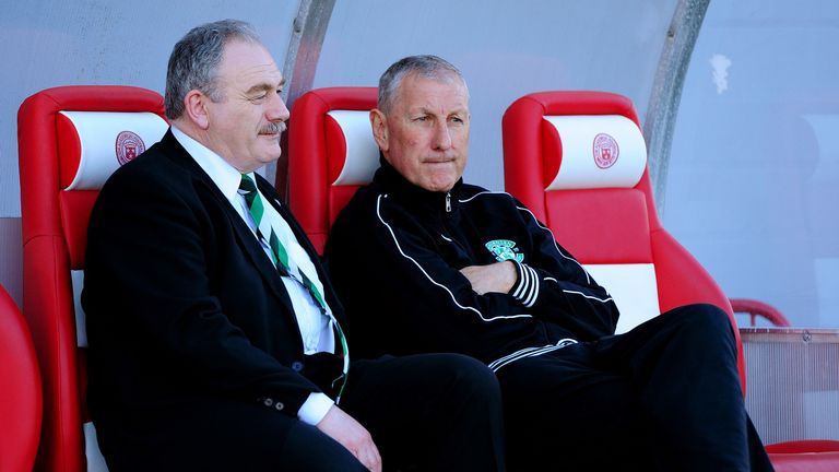 HAMILTON, SCOTLAND - MAY 21 : Hibernian manager Terry Butcher (R) speaking to Hibernian chairman Rod Petrie (L), before the Scottish Premiership Play-off Final First Leg, between Hamilton Academical and Hibernian at New Douglas Park on May 21, 2014 in Hamilton Scotland. (Photo by Mark Runnacles/Getty Images)
