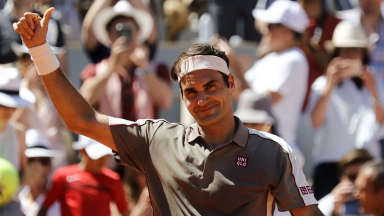 Switzerland's Roger Federer celebrates after winning against Argentina's Leonardo Mayer during their men's singles fourth round match on day eight of The Roland Garros 2019 French Open tennis tournament in Paris on June 2, 2019