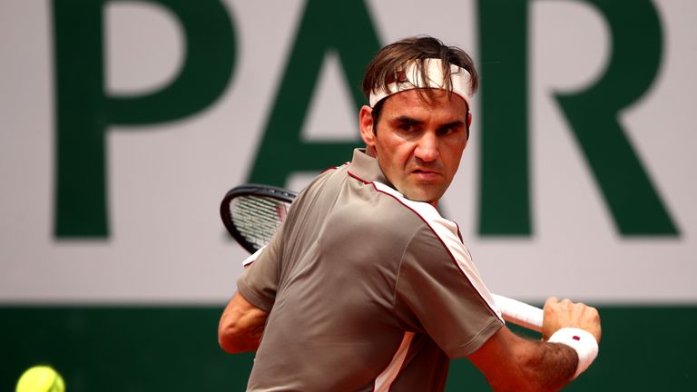 Roger Federer of Switzerland plays a backhand during his mens singles quarter-final match against Stan Wawrinka of Switzerland during Day ten of the 2019 French Open at Roland Garros on June 04, 2019 in Paris, France.