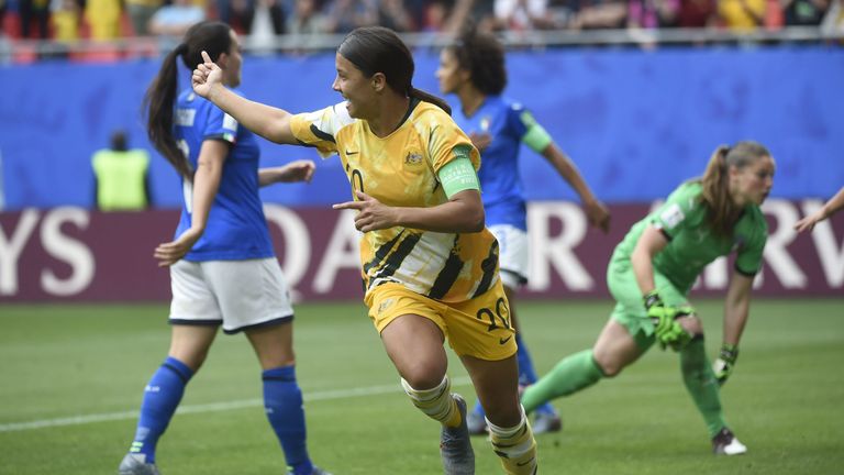 Sam Kerr celebrates after putting the Matildas ahead against Italy.