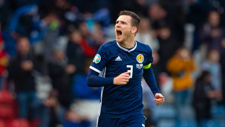 Scotland's Andy Robertson celebrates after he makes it 1-0