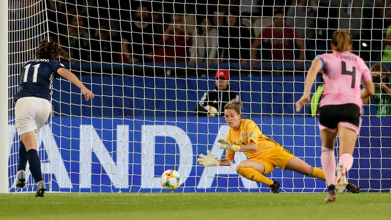 Scotland goalkeeper Lee Alexander saves a penalty from Argentina's Florencia Bonsegundo before it is retaken