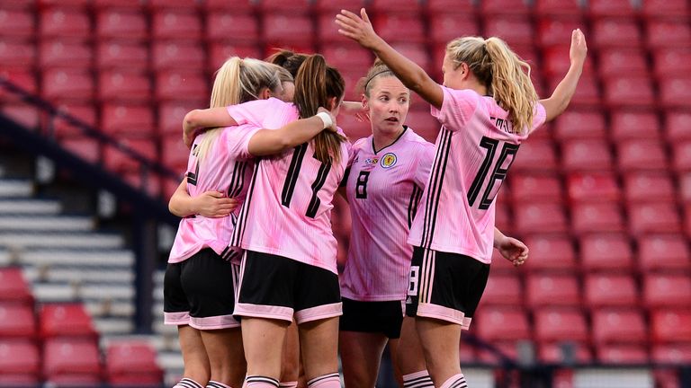 GLASGOW, SCOTLAND - MAY 28: The Scotland players celebrate with goal scorer Erin Cuthbert of Scotland during the Women's International Friendly between Scotland and Jamaica at Hampden Park on May 28, 2019 in Glasgow, Scotland. (Photo by Mark Runnacles/Getty Images)