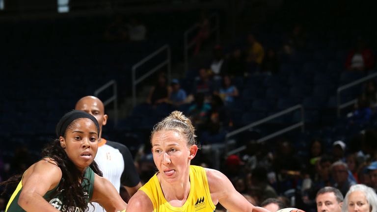 Courtney Vandersloot #22 of the Chicago Sky drives to the basket during the game against Jordin Canada #21 of the Seattle Storm on June 9, 2019 at the Wintrust Arena in Chicago, Illinois.