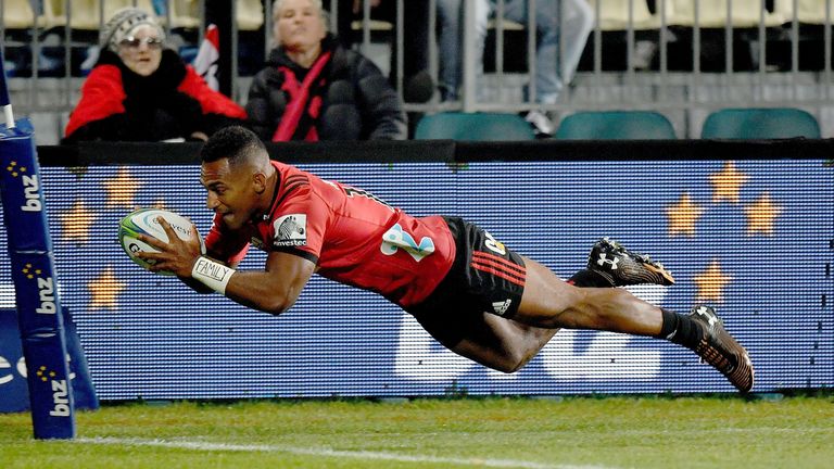 Crusaders' Sevu Reece scores a try during the Super Rugby semi-final match between New Zealand's Crusaders and Hurricanes in Christchurch on June 29, 2019. (Photo by Marty MELVILLE / AFP) (Photo credit should read MARTY MELVILLE/AFP/Getty Images)