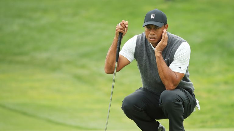  Woods managed 11 one-putt greens in his opening 70